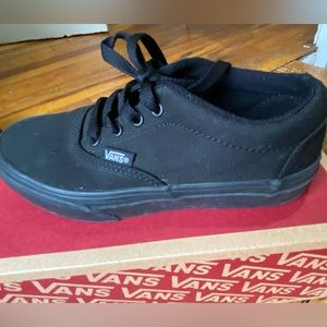 Black canvas Vans sneakers